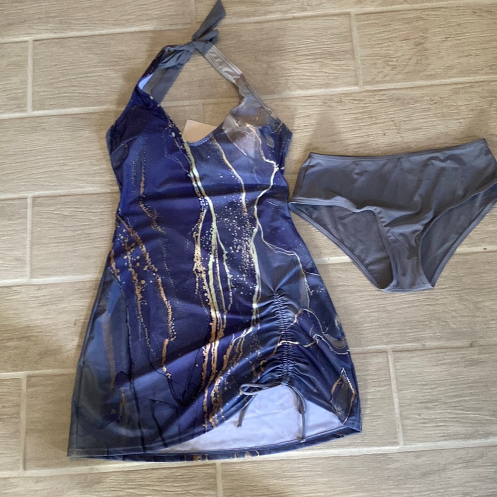 New with tags. Bathing suit dress with bottoms  Size S flattering and comfy!